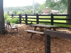A shaded seating area at Green Meadows Community Garden in Cobb County.